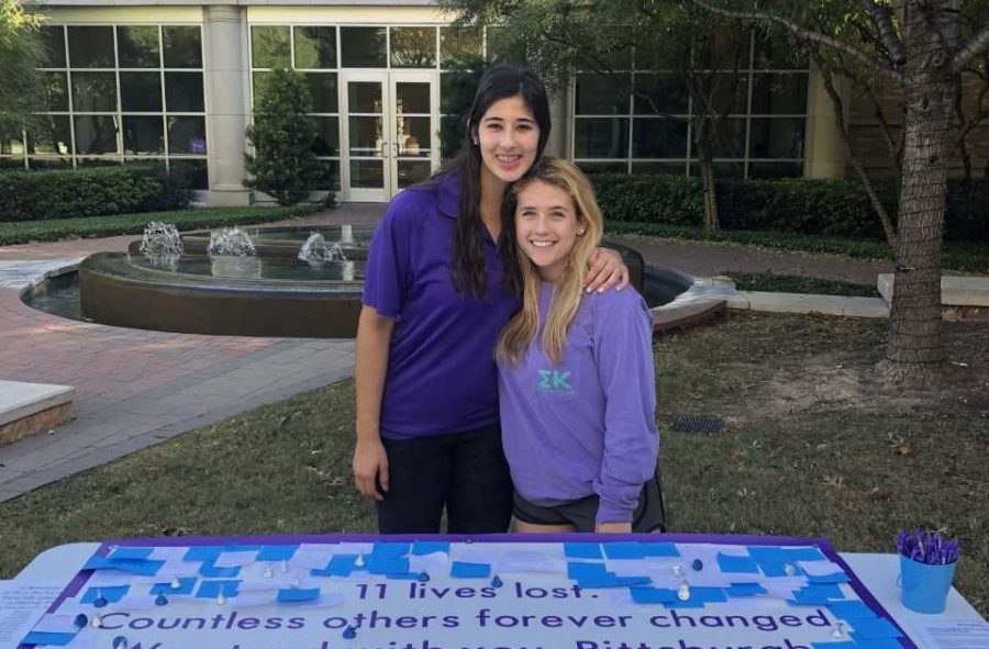 TCU+Hillel+Jewish+Student+Foundation+President+Viola+Clark+poses+with+a+friend+at+a+booth+to+remember+and+honor+those+lost+in+the+Pittsburgh+massacre.+Photo+courtesy+of+Viola+Clark.