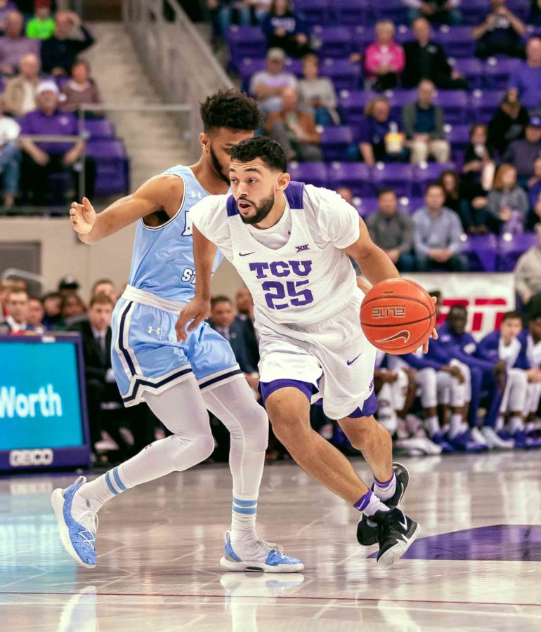 TCU point guard Alex Robinson leads the Horned Frog fast break against Indiana State. Photo by Cristian ArguetaSoto. 