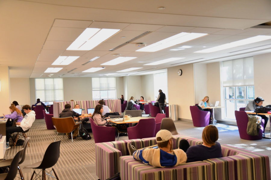 TCU students studying in the Mary Couts Burnett Library.