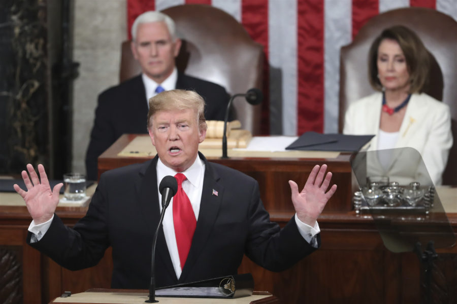 FILE - In this Feb. 5, 2019 file photo, President Donald Trump delivers his State of the Union address to a joint session of Congress on Capitol Hill in Washington, as Vice President Mike Pence and Speaker of the House Nancy Pelosi, D-Calif., watch, Tuesday, Feb. 5, 2019. With the next meeting between Trump and North Korean leader Kim Jong Un set for Feb. 27-28 in Vietnam, there’s hope and caution in South Korea on whether the leaders could agree to tangible steps toward reducing the North’s nuclear threat after a year of soaring but fruitless talks. (AP Photo/Andrew Harnik, File)