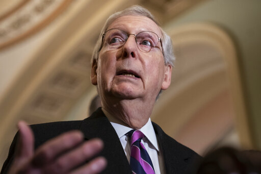 In this Feb. 26, 2019 file photo, Senate Majority Leader Mitch McConnell, R-Ky., speaks to reporters on Capitol Hill in Washington.  McConnell acknowledged Monday that opponents of President Donald Trump’s declaration of a national emergency along the U.S.-Mexico border have enough votes in the Republican-led Senate to prevail on a resolution aimed at blocking the move.  McConnell, who fell in line behind Trump despite his own misgivings about the declaration, said Trump will veto the resolution and that it’s likely to be sustained in Congress. McConnell’s remarks in his home state came after fellow Kentucky Sen. Rand Paul became the latest GOP lawmaker to say he can’t go along with the White House on the emergency declaration.  (AP Photo/J. Scott Applewhite)