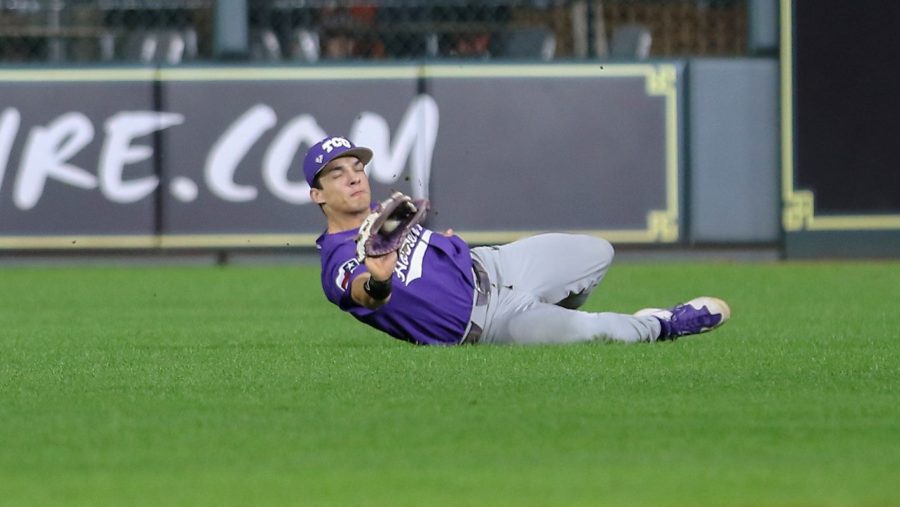 Center+fielder+Johnny+Rizer+makes+a+diving+catch+against+Rice.+Image+courtesy+of+gofrogs.com