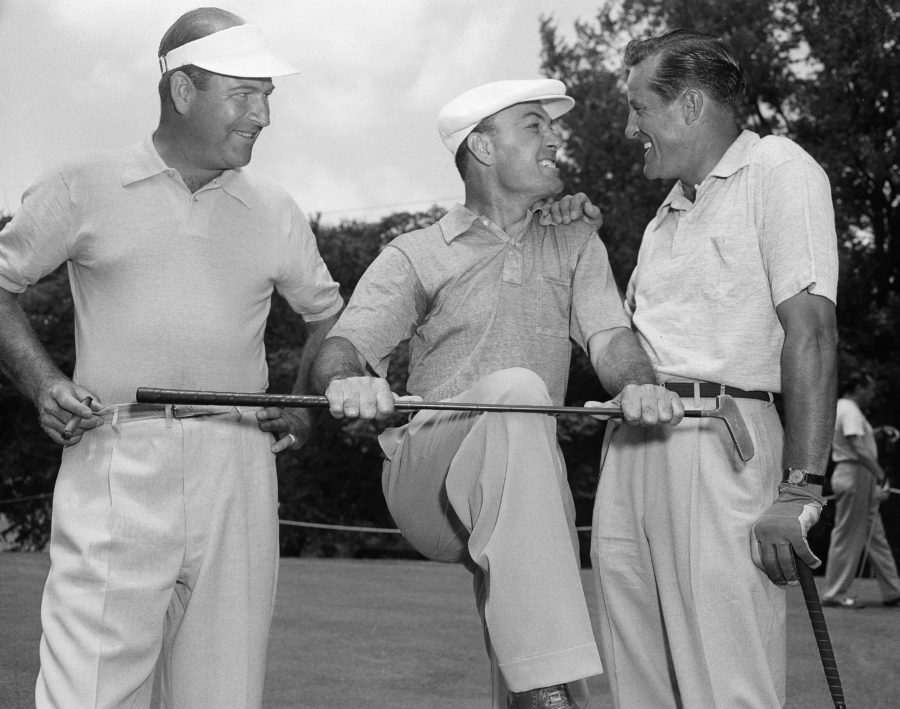 Ben Hogan, center, engages in conversation with Tommy Bolt as he shows his displeasure toward his putter after opening round play in Colonial National Invitation golf tournament in Fort Worth, Texas, May 22, 1952. Other person unidentified. (AP Photo/Carl Linde)