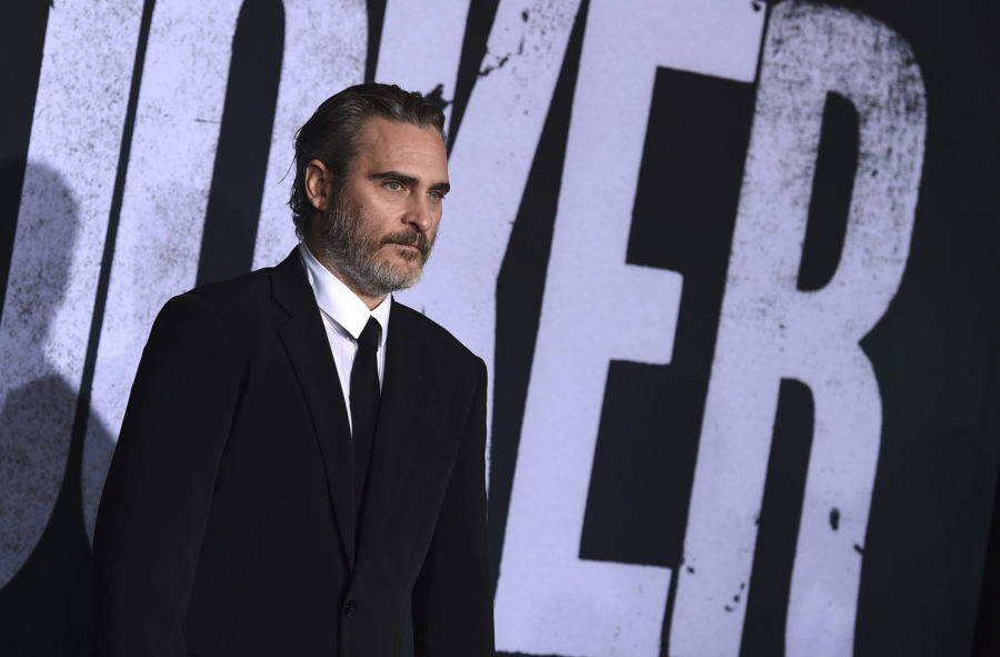 Joaquin Phoenix arrives at the Los Angeles premiere of Joker at TCL Chinese Theatre on September 8, 2019. (Photo by Jordan Strauss/Invision/AP)