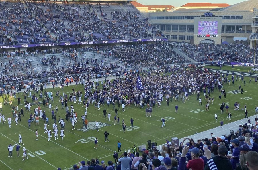 Students storm the field after TCUs 10-point win over No. 15 Texas Saturday. Photo by Cristian ArguetaSoto. 