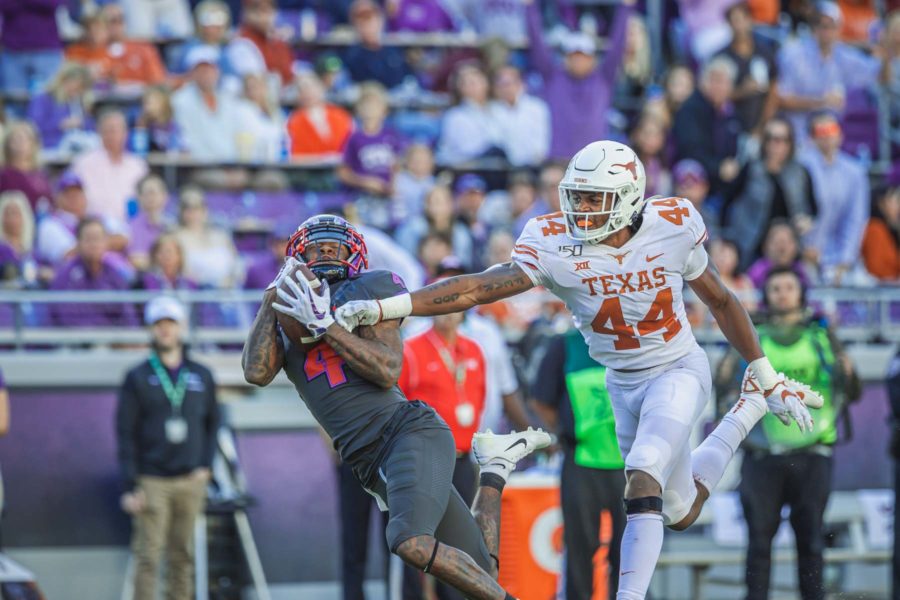 TCU receiver Taye Barber (4) makes a contested catch against Texas in the Horned Frogs 37-27 win at home in 2019. (Cristian ArguetaSoto/Staff Photographer)