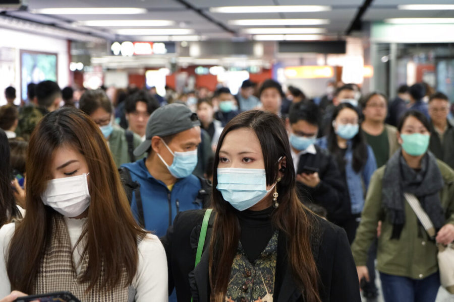 Passengers+wear+masks+to+prevent+an+outbreak+of+a+new+coronavirus+in+a+subway+station%2C+in+Hong+Kong%2C+Wednesday%2C+Jan.+22%2C+2020.+The+first+case+of+coronavirus+in+Macao+was+confirmed+on+Wednesday%2C+according+to+state+broadcaster+CCTV.+The+infected+person%2C+a+52-year-old+woman%2C+was+a+traveller+from+Wuhan.+%28AP+Photo%2FKin+Cheung%29