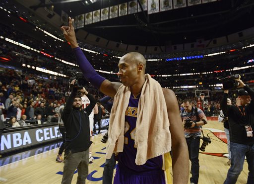 Los Angeles Lakers Kobe Bryant (24), waves to the crowd after an NBA basketball game against the Chicago Bulls Sunday, Feb. 21, 2016, in Chicago. Chicago won 126-115. (AP Photo/Paul Beaty)