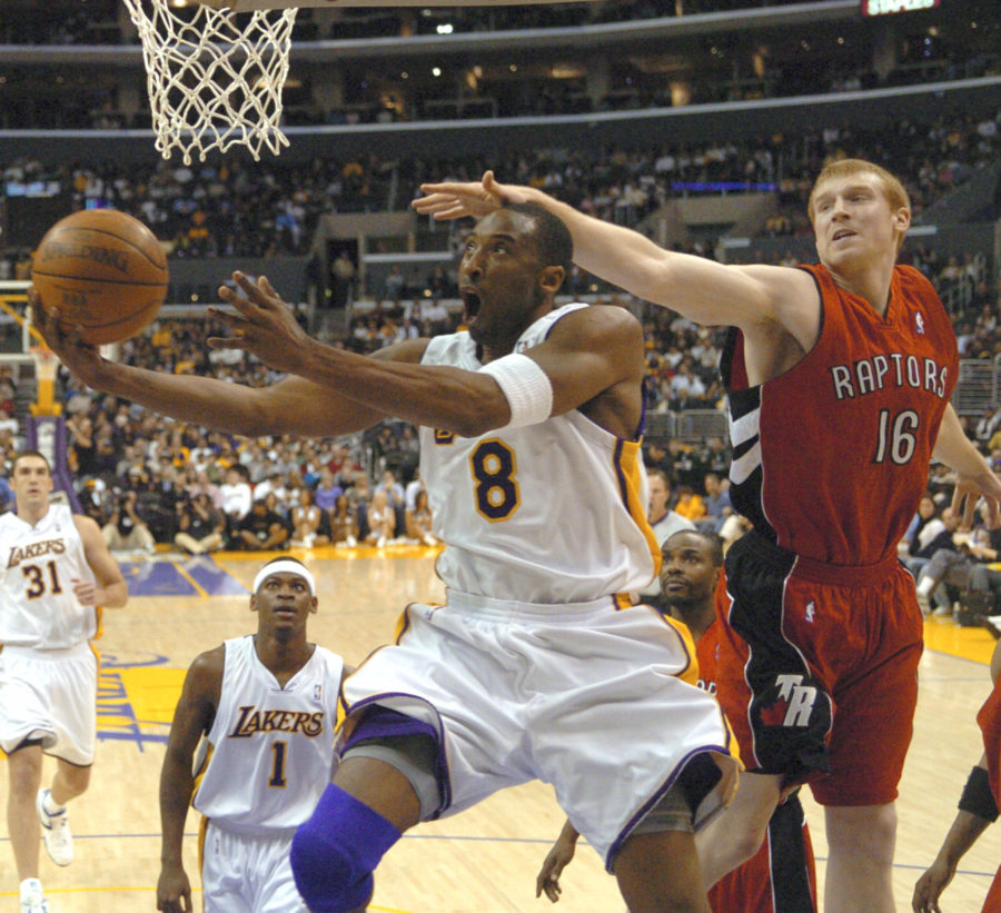 Toronto Raptors Matt Bonner cant stop Los Angeles Lakers Kobe Bryant from getting to the basket in the first half of NBA basketball action on Sunday, Jan. 22, 2006, in Los Angeles. Bryant scored 81 points in the game as the Lakers beat the Raptors, 122-104. (AP Photo/Matt A. Brown)