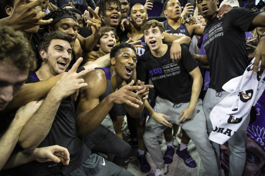 TCU Players are posing for a photo after the game.
Photo by Heesoo Yang