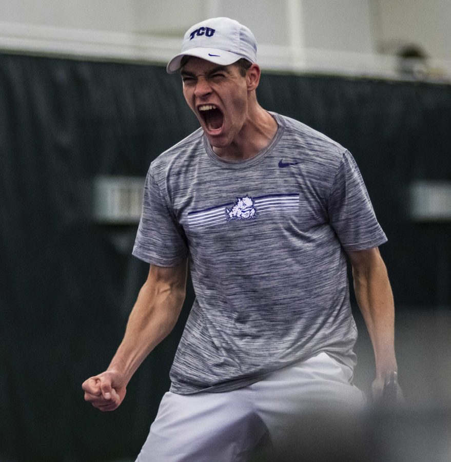 Alastair+Gray+celebrates+his+hard-fought%2C+three-set+singles+victory+against+USF+on+Feb+23%2C+2020.+Photo+by+Jack+Wallace