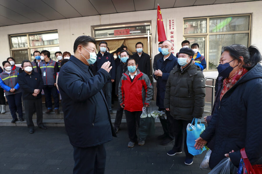 In+this+photo+released+by+Xinhua+News+Agency%2C+Chinese+President+Xi+Jinping+wearing+a+protective+face+mask+speaks+to+residents+as+he+inspects+the+novel+coronavirus+pneumonia+prevention+and+control+work+at+a+neighbourhoods+in+Beijing%2C+Monday%2C+Feb.+10%2C+2020.+China+reported+a+rise+in+new+virus+cases+on+Monday%2C+possibly+denting+optimism+that+its+disease+control+measures+like+isolating+major+cities+might+be+working%2C+while+Japan+reported+dozens+of+new+cases+aboard+a+quarantined+cruise+ship.+%28Pang+Xinglei%2FXinhua+via+AP%29