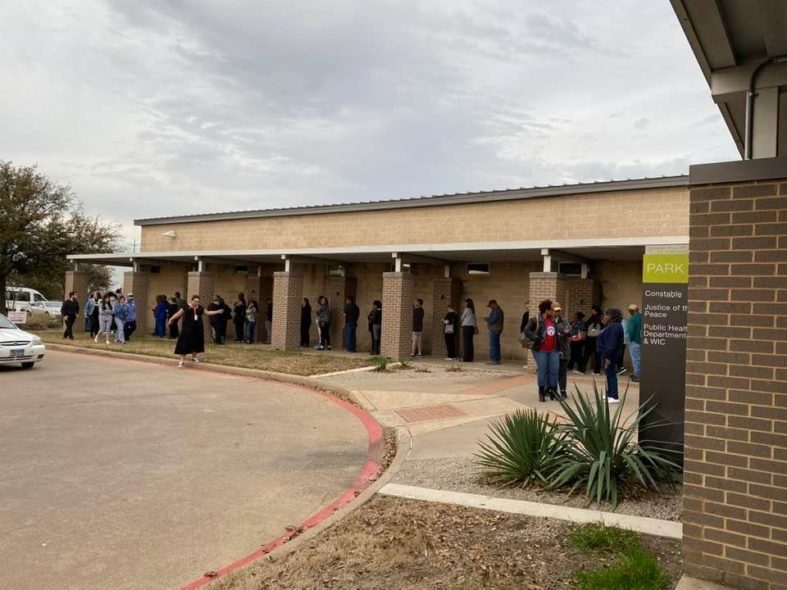 Voters wait in lines stretching out the building at a polling site in South Fort Worth. Photo courtesy Amiso George