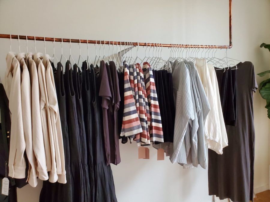 clothing on a rack at eco-fashion store Tribe Alive