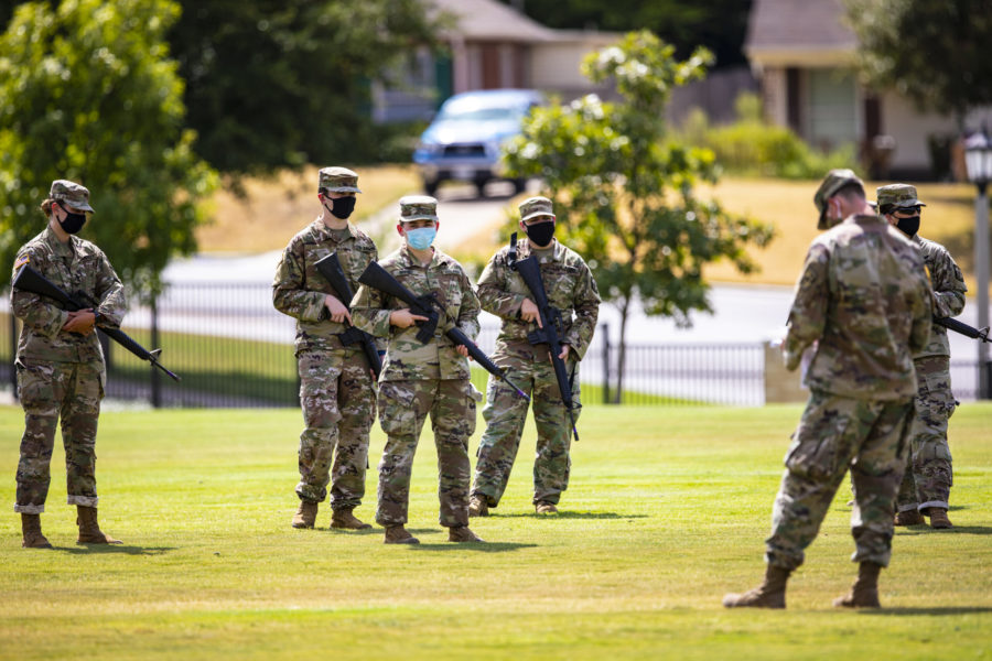 ROTC cadets train with dummy M4 rifles.