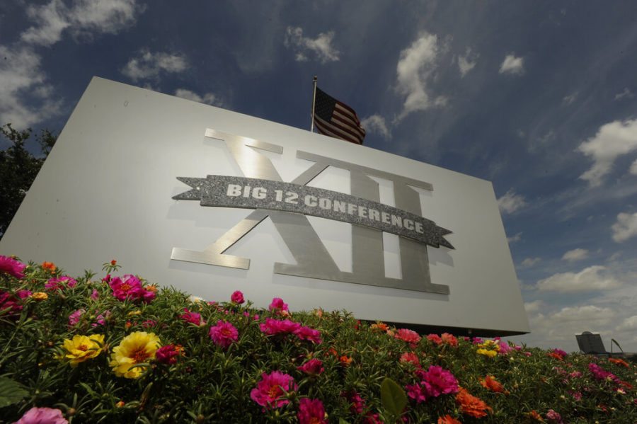 FILE - In this June 14, 2010, file photo,  a Big 12 sign is seen outside the conference headquarters in Irving, Texas. The coronavirus pandemic has shuttered sports at all levels, but all Big 12 schools expect their campuses to be open in the fall, lending hope to the possibility that football can start on time. (AP Photo/Cody Duty, File)