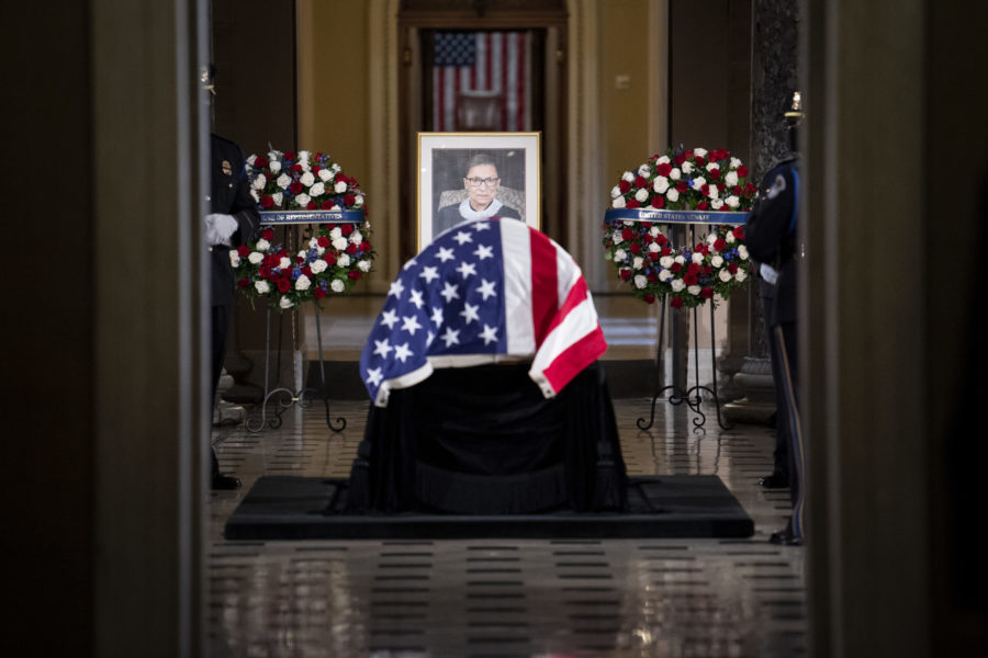 Justice Ruth Bader Ginsburg lies in state in Statuary Hall of the U.S. Capitol in Washington on Friday, Sept. 25, 2020. (Caroline Brehman/Pool via AP)