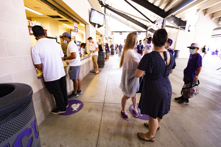 TCU Fans wait in line to get their food.
