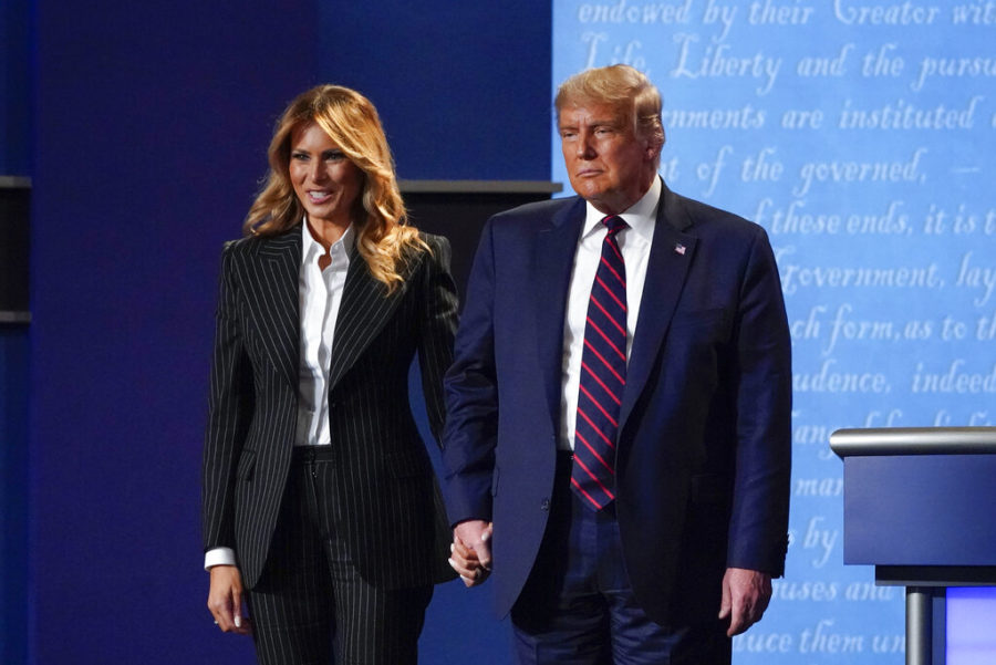 President+Donald+Trump+and+first+lady+Melania+Trump+hold+hands+on+stage+after+the+first+presidential+debate+at+Case+Western+University+and+Cleveland+Clinic%2C+in+Cleveland%2C+Ohio%2C+Sept.+29%2C+2020.+%28AP+Photo%2FJulio+Cortez%2C+File%29