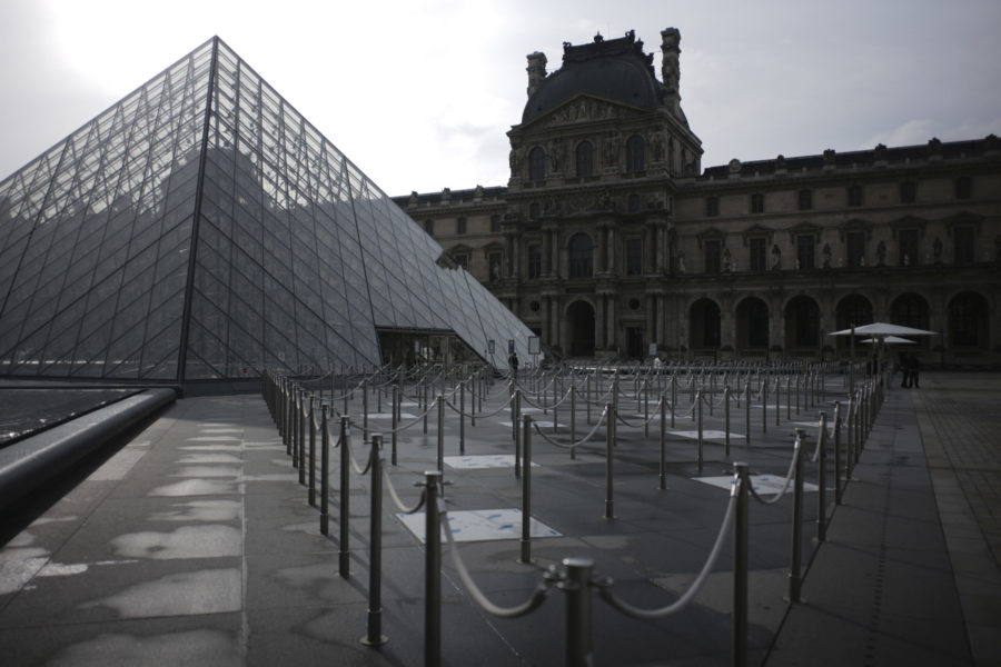 The empty courtyard of the Louvre museum is pictured Wednesday, Oct.14, 2020 in Paris. French President Emmanuel Macron is giving a nationally televised interview Wednesday night to speak about the virus, his first in months. French media reports say Macron will also step up efforts on social media to press the need for virus protections among young people. (AP Photo/Lewis Joly)