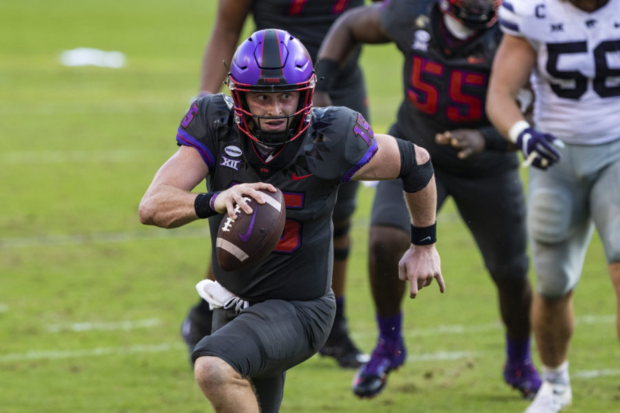 Quarterback Max Duggan rushes for a touchdown late in the fourth quarter.