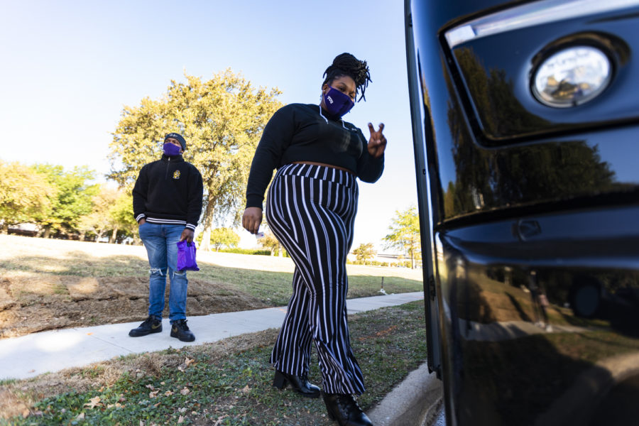 The Office of Multicultural & International Student Services provided transportation to the Southwest Regional Library polling location on Saturday, Oct. 17, 2020. Students, faculty and staff were invited to register in advance to be able to vote. (Heesoo Yang/Staff Photographer)