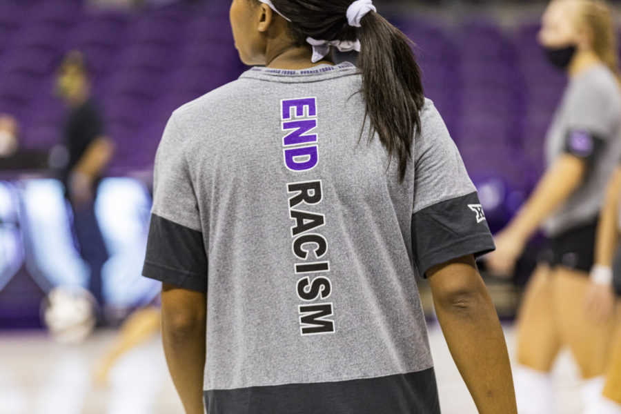 Volleyball players wore End Racism t-shirts.