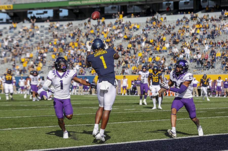 Nov 14, 2020; Morgantown, West Virginia, USA; West Virginia Mountaineers wide receiver T.J. Simmons (1) catches a touchdown pass during the second quarter against the TCU Horned Frogs at Mountaineer Field at Milan Puskar Stadium. Mandatory Credit: Ben Queen-USA TODAY Sports