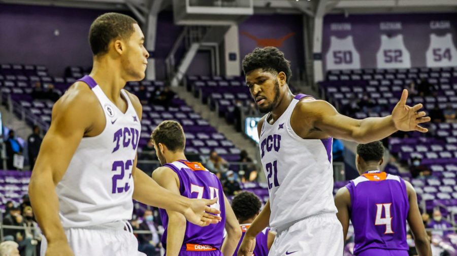 Kevin Samuel (21) high fives Jaedon LeDee (23) midway through TCUs win over Northwestern State on Dec. 3, 2020. Photo courtesy of gofrogs.com