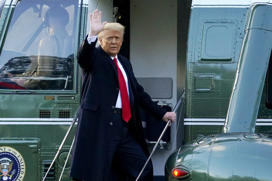 In this Wednesday, Jan. 20, 2021, file photo, President Donald Trump waves as he boards Marine One on the South Lawn of the White House, in Washington, en route to his Mar-a-Lago Florida Resort. Former President Trump has named two lawyers to his impeachment defense team, one day after it was revealed that the former president had parted ways with an earlier set of attorneys. (AP Photo/Alex Brandon, File)