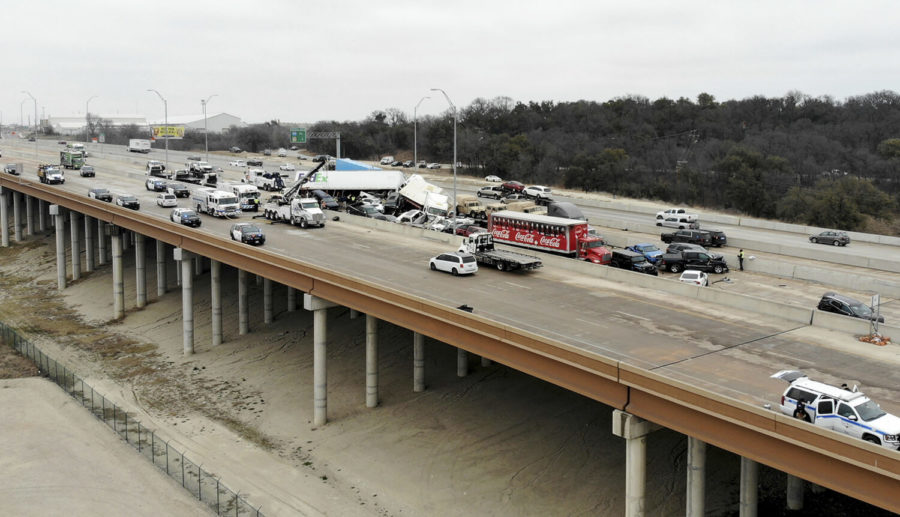 First+responders+work+the+scene+of+a+fatal+crash+on+I-35+near+downtown+Fort+Worth+on+Thursday%2C+Feb.+11%2C+2021.++Police+say+at+some+people+were+killed+and+dozens+injured+in+a+massive+crash+involving+75+to+100+vehicles+on+an+icy+Texas+interstate.++%28Amanda+McCoy+%2FStar-Telegram+via+AP%29