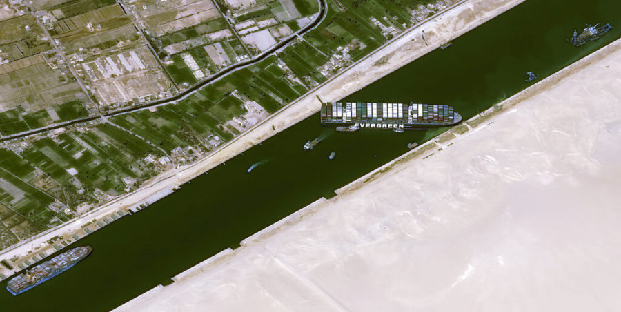 This satellite image from Cnes2021, Distribution Airbus DS, shows the cargo ship MV Ever Given stuck in the Suez Canal near Suez, Egypt, Thursday, March 25, 2021. The skyscraper-sized cargo ship wedged across Egypts Suez Canal further imperiled global shipping Thursday as at least 150 other vessels needing to pass through the crucial waterway idled waiting for the obstruction to clear, authorities said. (Cnes2021, Distribution Airbus DS via AP)