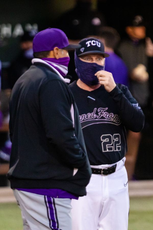 TCU and SFA Head coaches confer before the game.