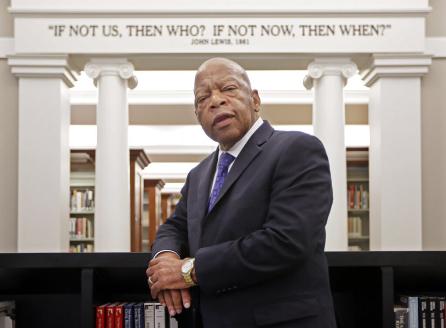 FILE - This Nov. 18, 2016 file photo shows Rep. John Lewis, D-Ga., in the Civil Rights Room in the Nashville Public Library in Nashville, Tenn. The award-winning graphic novels about the congressmen and civil rights activist John Lewis will continue a year after his death. Abrams announced Tuesday that “Run: Book One” will be published Aug. 3, just over a year after Lewis died at age 80. (AP Photo/Mark Humphrey, File)