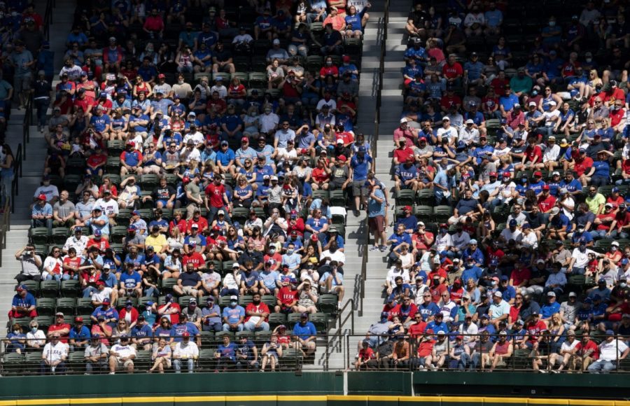 Fans+fill+the+stands+at+Globe+Life+Field+during+the+first+inning+of+a+baseball+game+between+the+Texas+Rangers+and+the+Toronto+Blue+Jays%2C+Monday%2C+April+5%2C+2021%2C+in+Arlington%2C+Texas.+The+Rangers+are+set+to+have+the+closest+thing+to+a+full+stadium+in+pro+sports+since+the+coronavirus+shutdown+more+than+a+year+ago.+%28AP+Photo%2FJeffrey+McWhorter%29
