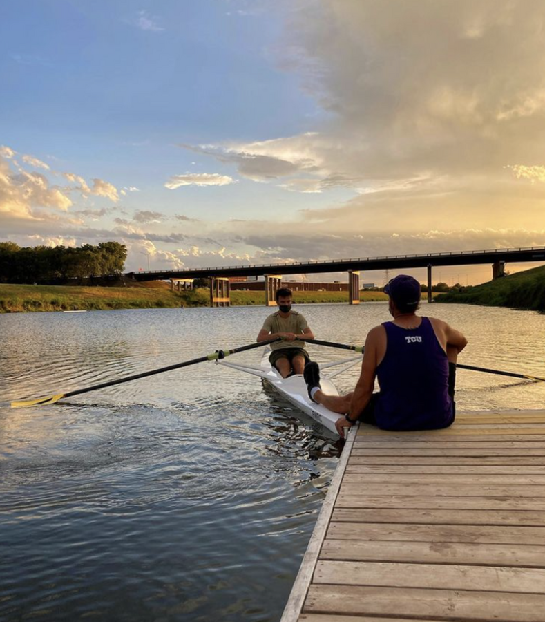The TCU rowing team at a sunset practice (Photo courtesy of TCU rowing Instagram)