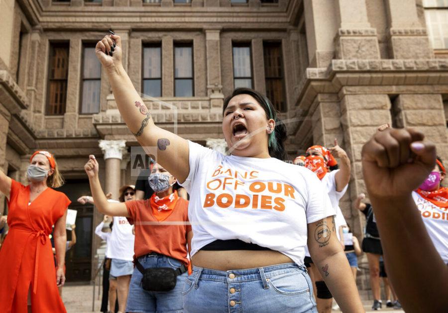 Leen Garza participates in a protest against the six-week abortion ban at the Capitol in Austin, Texas, on Wednesday, Sept. 1, 2021. Dozens of people protested the abortion restriction law that went into effect Wednesday. (Jay Janner/Austin American-Statesman via AP)
