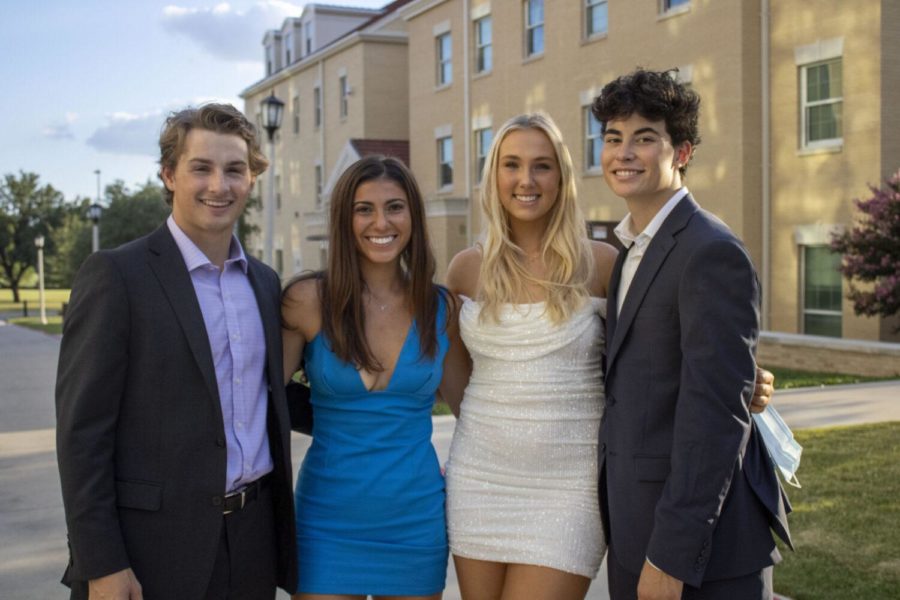 Pi+Beta+Phi+and+Pi+Kappa+Phi+members+posed+for+photos+in+Greek+village+before+the+formal.+Photo+by+Allie+Brown