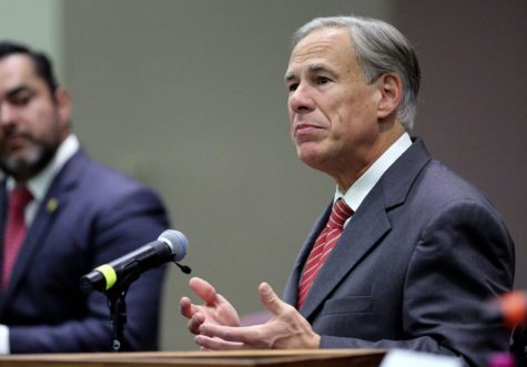 FILE - In this Sept. 22, 2021, file photo, Texas Gov. Greg Abbott speaks before he signs an anti-smuggling bill at McAllen City Hall in McAllen, Texas. Gov. Abbott has signed redrawn voting maps that pave a safer path for the GOPs slipping majority, leaving opponents hoping courts will block the newly gerrymandered districts before they can be used in the 2022 elections. Abbott signed the maps Monday, Oct. 25, 2021, according to a spokeswoman for the governor. (Joel Marinez/The Monitor via AP, File)