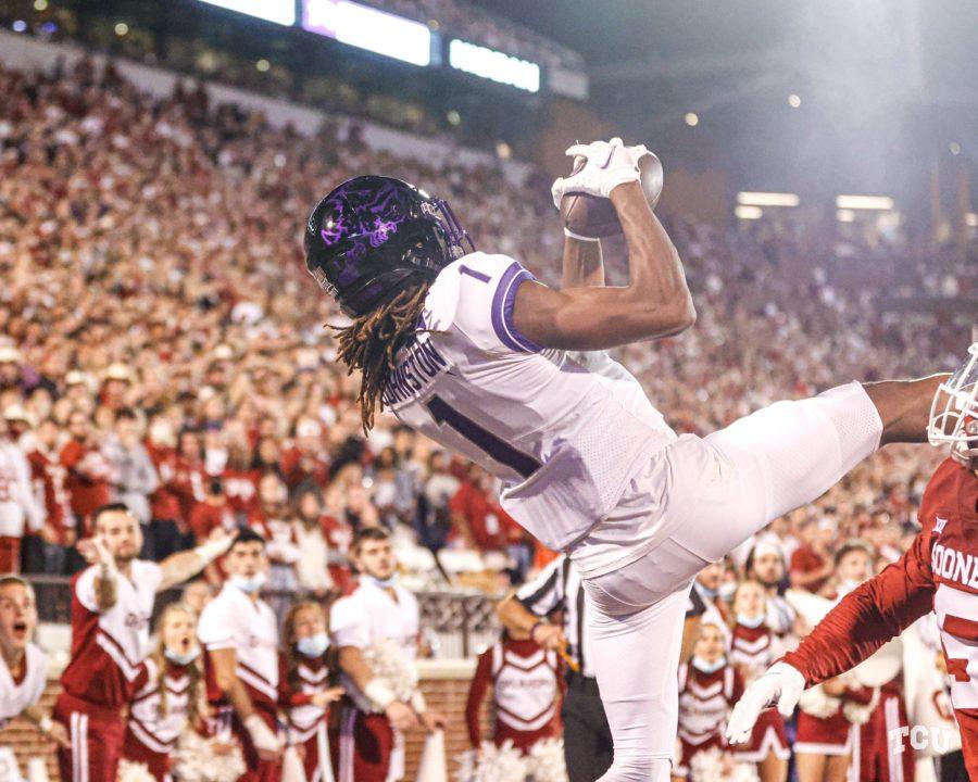 TCU+wide+receiver+Quentin+Johnston+%281%29+hauls+in+a+touchdown+catch+over+his+defender+in+TCUs+52-31+loss+to+Oklahoma+on+Oct.+16%2C+2021.+%28Photo+courtesy+of+%40TCUFootballs+Twitter%29