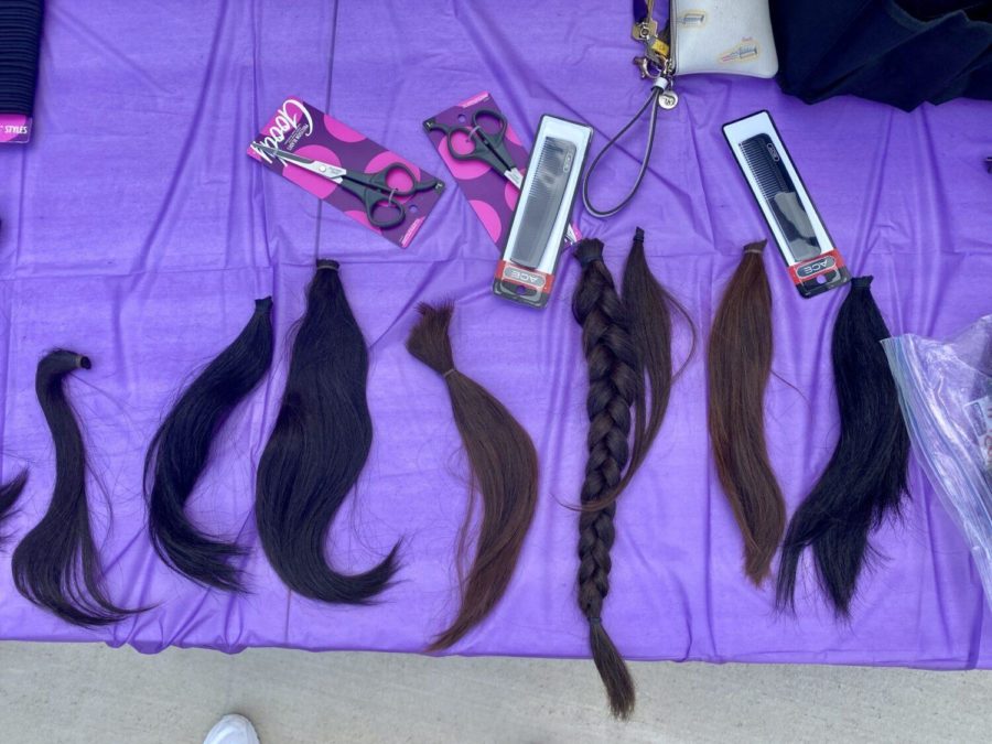 TCU+students+organized+a+hair+donation+drive+on+Thursday%2C+Sept.+30%2C+to+raise+awareness+for+childhood+cancer+and+collect+hair+to+be+made+into+wigs.+%28Staff+Photographer%3A+Leah+Bolling%29