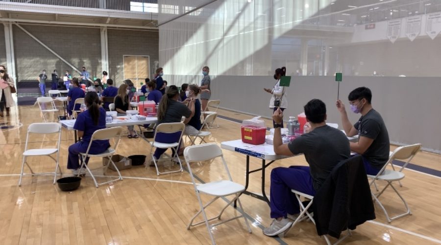 TCU nursing students give out flu vaccinations. (Photo by Lonyae Coulter)