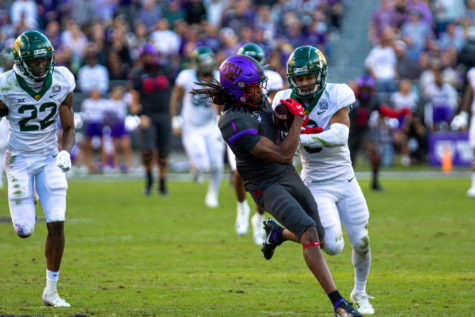 TCU wide receiver Quentin Johnston hauls in a deep ball in TCUs 30-28 win over No. 12 Baylor on Nov. 6, 2021. (Esau Rodriguez/Staff Photographer)