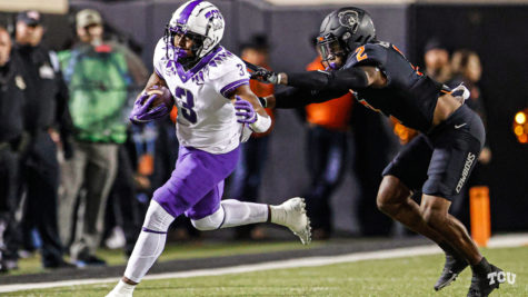 TCU running back Emari Demercado (3) tries to avoid a defender in TCUs 63-17 loss to Oklahoma State on the road on Nov. 13, 2021. (Photo courtesy of gofrogs.com)
