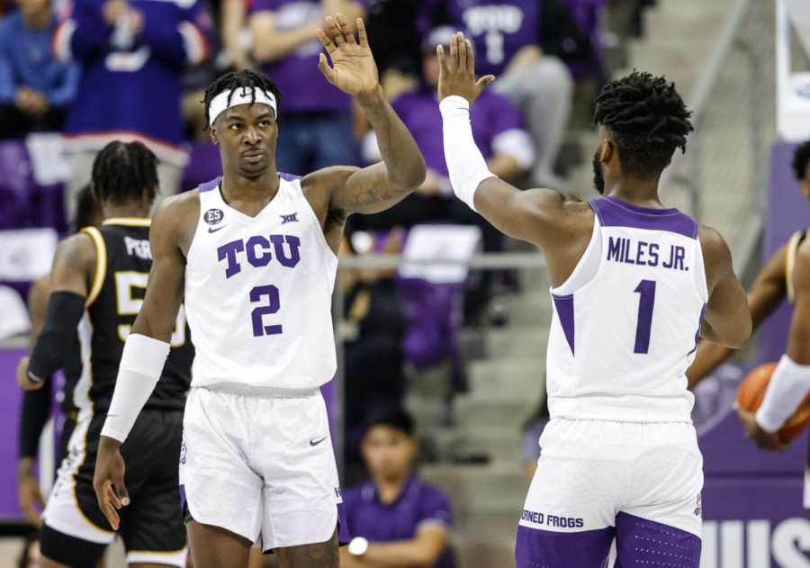 TCU+forward+Emanuel+Miller+%282%29+and+guard+Mike+Miles+%281%29+high+five+in+the+Frogs+83-51+win+over+Southern+Miss+on+Nov.+15%2C+2021.+%28Photo+courtesy+of+gofrogs.com%29