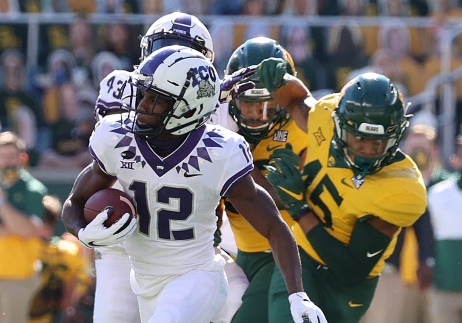 TCU wide receiver Derius Davis (12) runs past the Baylor special teams for a touchdown in the first half of an NCAA college football game in Waco, Texas, Saturday, Oct. 31, 2020. (Jerry Larson/Waco Tribune-Herald via AP)