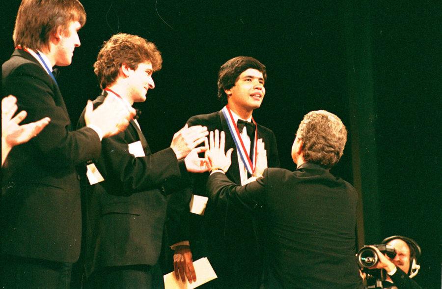 Van Cliburn congratulates Jose Feghali, Brazilian pianist and former Artist-in-Residence at Texas Christian University's school of music, after winning the gold medal at the Van Cliburn Competition on June 6, 1985. (Photo via UTA Libraries Digital Gallery) 