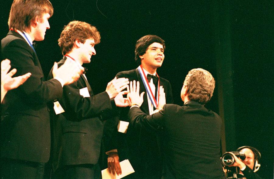 Van Cliburn congratulates Jose Feghali, Brazilian pianist and former Artist-in-Residence at Texas Christian University's school of music, after winning the gold medal at the Van Cliburn Competition in 1985. (“Jose Feghali congratulated by Van Cliburn”, 1985, via UTA Libraries Digital Gallery)