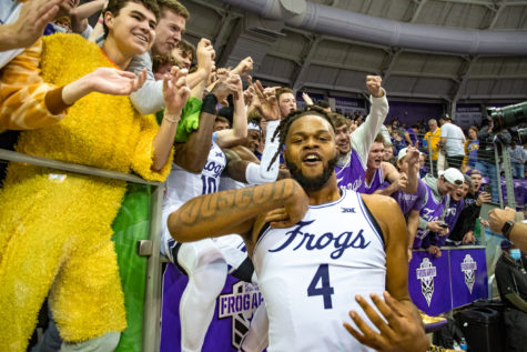TCU forward Eddie Lampkin (4) celebrates with fans following the Frogs 77-68 win over No. 19 LSU on Jan. 29, 2022 in Fort Worth, Texas. (Esau Rodriguez Olvera/Head Staff Photographer)