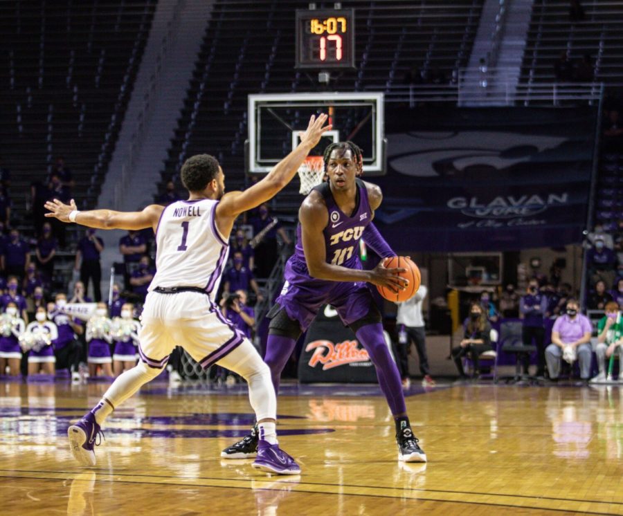TCU+guard+Damion+Baugh+%2810%29+controls+the+ball+during+TCUs+60-57+win+over+Kansas+State+on+Jan.+12%2C+2022.+%28Photo+courtesy+of+gofrogs.com%29